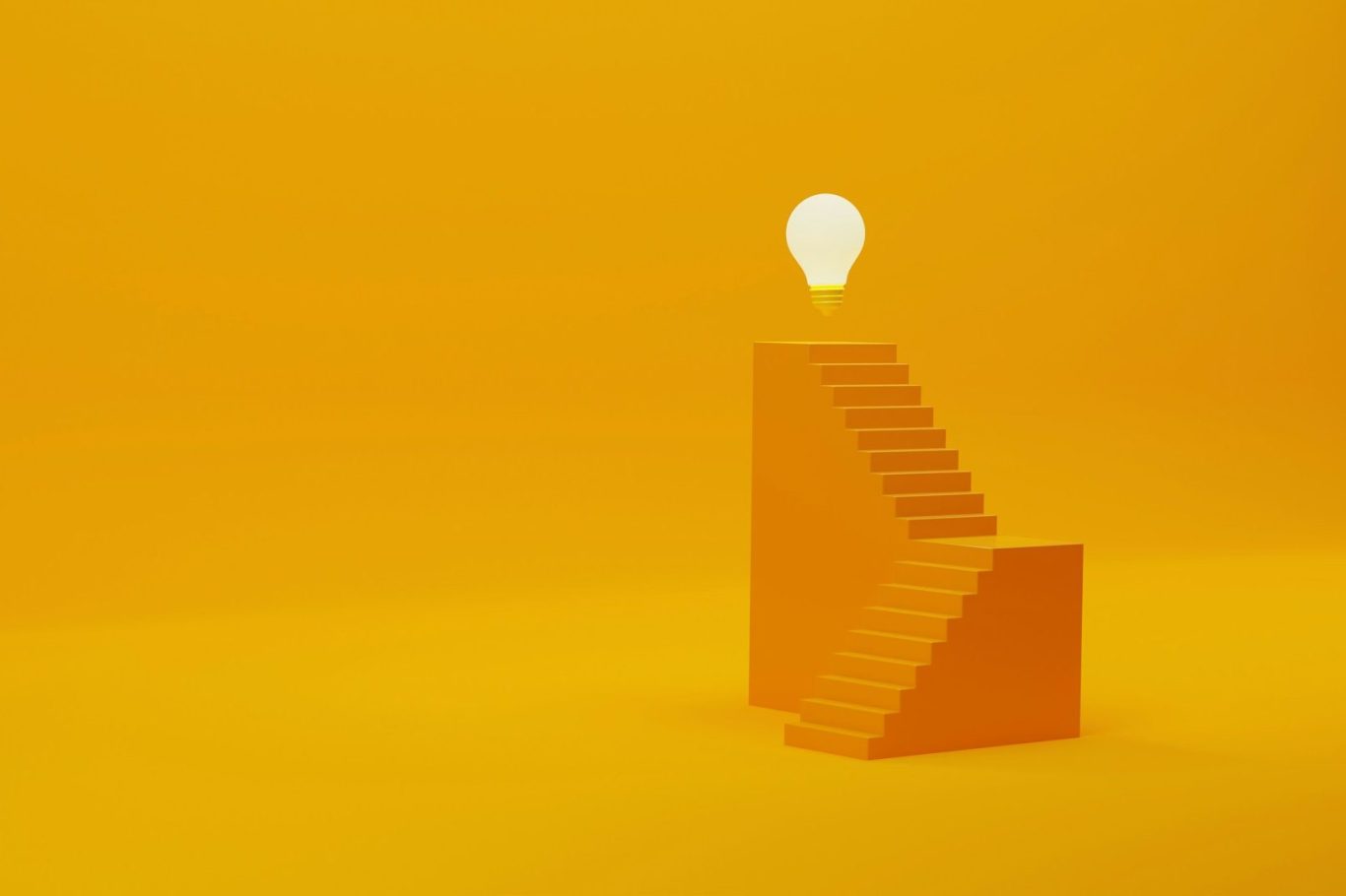 Eine Treppe mit einer Glühbirne an der Spitze